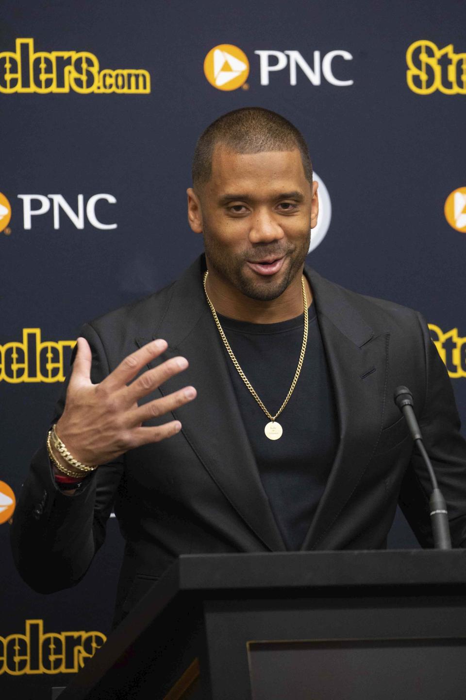 Pittsburgh Steelers newly-signed quarterback Russell Wilson speaks during an NFL football news conference in Pittsburgh, Friday, March 15, 2024, in Pittsburgh. Wilson signed a one-year deal with the Steelers after he was cut by the Denver Broncos. (AP Photo/Rebecca Droke)