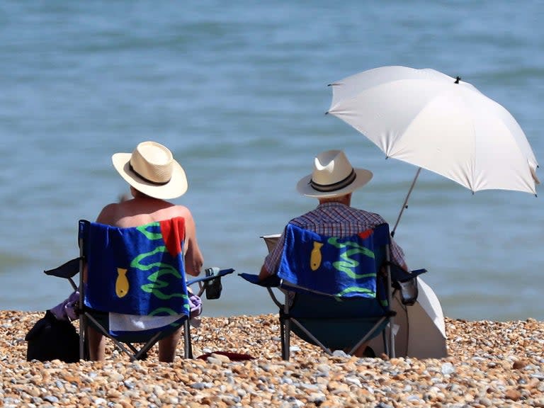 Britain is set to bask in sunshine as temperatures hit 27C, before heavy rain sweeps across the country.The week will start off warm and dry before temperatures soar on Tuesday, the Met Office said.Highs of 27C are expected and there is a chance temperatures could climb to 28C In London and Bristol.The capital and southeast England will get the best of the weather, with a risk of heavy showers in northern parts of the UK.It comes after Britain recorded its hottest day of the year at the end of June as temperatures rose to 34C in west London.The heatwave was brought on by an “enormous” bubble of warm air from the Sahara which spread across Europe.But the sunny weather will not last all week, with thick cloud and bands of rain spreading east from the west of the country on Wednesday.However, the unsettled weather will be broken up by sunny spells followed by brighter, fresher conditions.Temperatures will drop closer to average for this time of year, with highs of 24C in London and 20C in Leeds by Friday. But it is likely to feel cooler under the cloud and rain.The average temperature for July is 19C across the UK and 21C in England.Moving into the weekend, it is likely to turn more unsettled with rain and stronger winds moving northeast across the UK.Heavy rain is likely to hit southern and western areas, the Met Office said.Nicola Maxey, a spokesperson for the Met Office, said: “The start of the week will be fine, dry and sunny across much of the country.“On Tuesday, there is an isolated chance temperatures will hit 28C in London and the far west of Bristol.“From Wednesday, the weather will turn more unsettles but there will still be some sunny spells – so it’s not all doom and gloom.“Although temperatures will feel much cooler under the cloud and rain.”