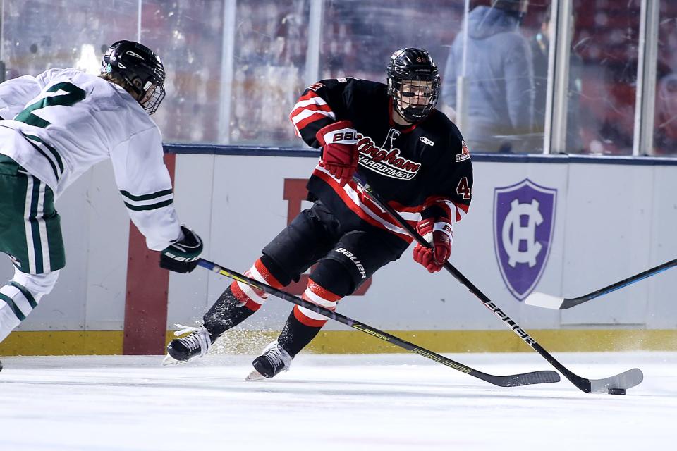 Hingham's Paul Dzavik goes on the attack during their exhibition game at Frozen Fenway at Fenway Park on Wednesday, Jan. 11, 2023. 