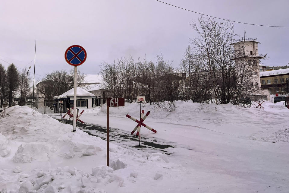 A view of the entrance of the prison colony in the town of Kharp, in the Yamalo-Nenetsk region about 1,900 kilometers (1,200 miles) northeast of Moscow, Russia, on Sunday, Feb. 18, 2024. Alexei Navalny, the fiercest foe of Russian President Vladimir Putin who crusaded against official corruption and staged massive anti-Kremlin protests, died in prison Friday Feb. 16, 2024 Russia's prison agency said. He was 47. (AP Photo)