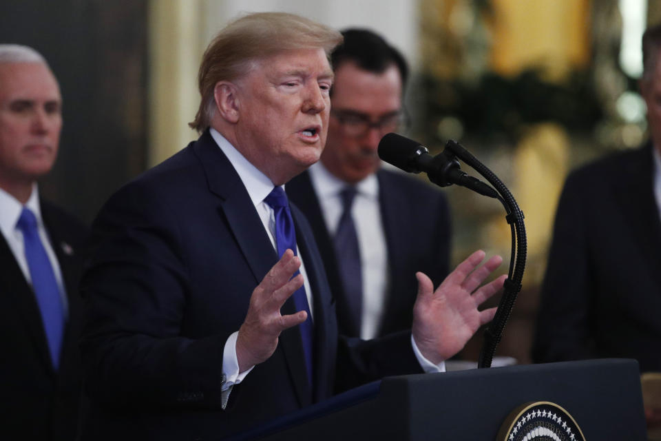 President Donald Trump, gestures during a signing ceremony with Chinese Vice Premier Liu He to sign a U,S, China trade agreement, in the East Room of the White House, Wednesday, Jan. 15, 2020, in Washington. (AP Photo/Steve Helber)