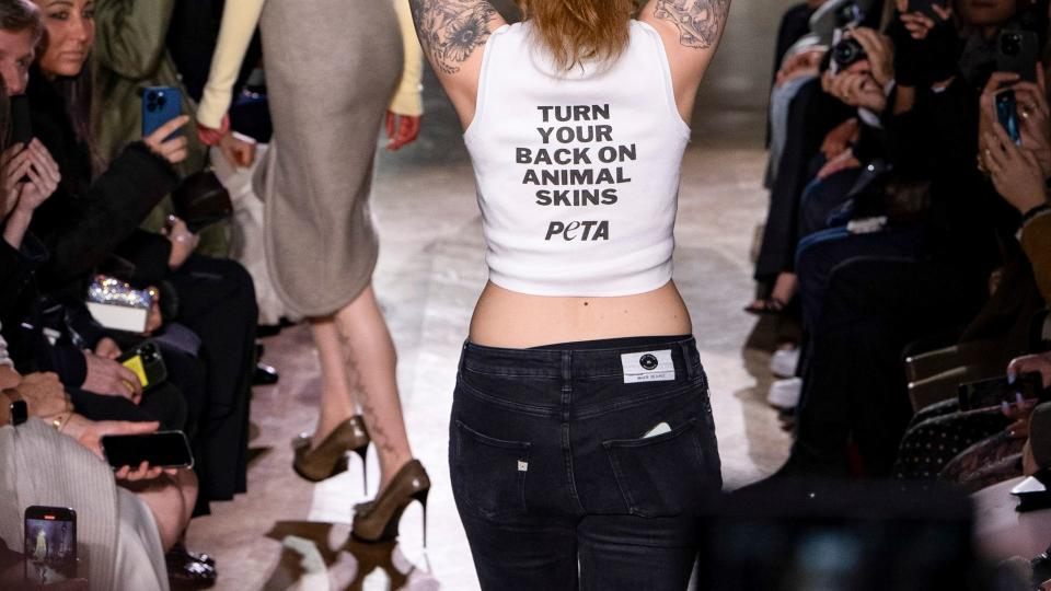 PETA protestors stormed the runway during the Victoria Beckham Ready to Wear Fall/Winter 2024-2025 fashion show as part of the Paris Fashion Week on March 1, 2024 in Paris, France. (Photo by Victor VIRGILE/Gamma-Rapho via Getty Images)