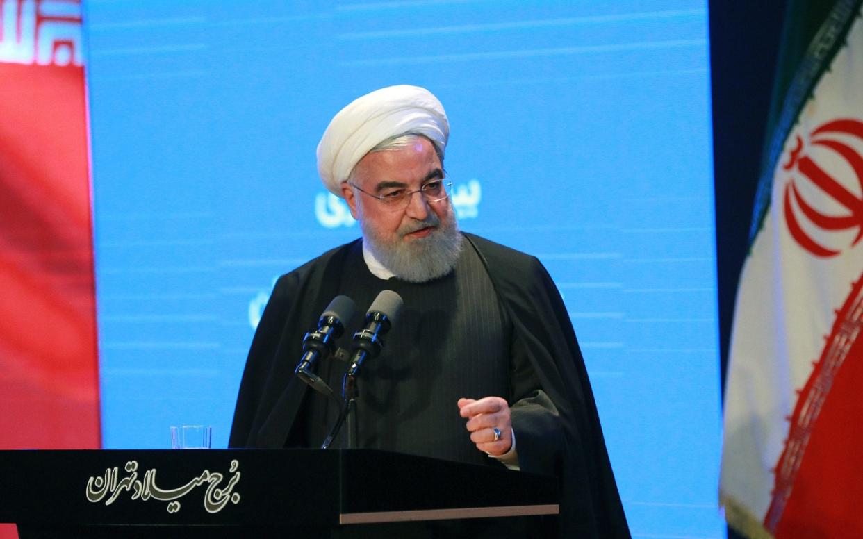 Iranian president Hassan Rouhani said the plan would lift 'hardship' in the country  - AFP