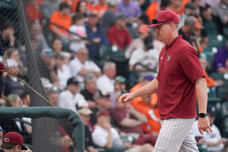 South Carolina coach Mark Kingston walks back to the dugout during an NCAA baseball game against Clemson at Segra Park on Saturday, March 5, 2022, in Columbia, S.C. Clemson won 10-2. (AP Photo/Sean Rayford)