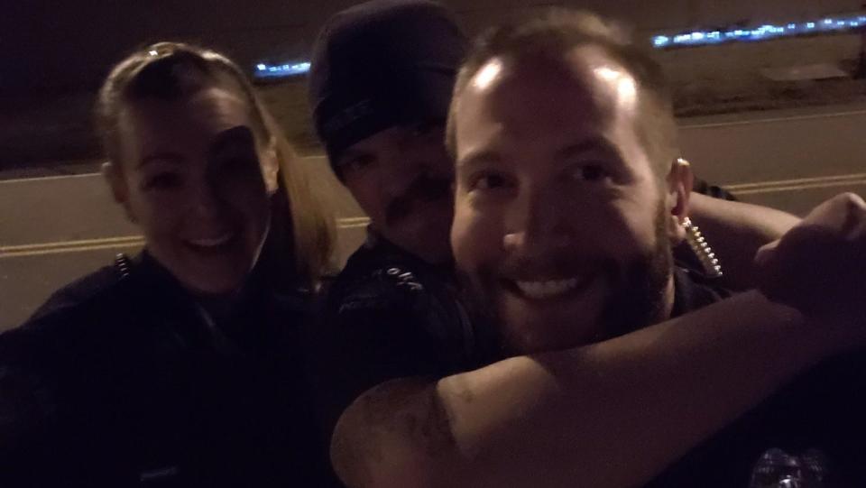 A photo showing former officers Erica Marrero, Jaron Jones and Kyle Dittrich taken on Oct. 20, 2019, at the memorial for Elijah McClain, according to the Aurora Police Department.