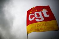 A CGT labour union flag is seen at the French oil giant Total Refinery in Donges