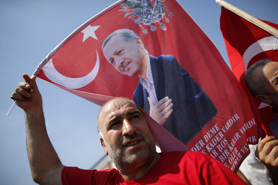 Turkish man waves a flag