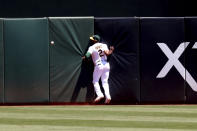 Oakland Athletics' Starling Marte can't catch a double hit by San Diego Padres' Trent Grisham during the fourth inning of a baseball game in Oakland, Calif., Wednesday, Aug. 4, 2021. (AP Photo/Jed Jacobsohn)