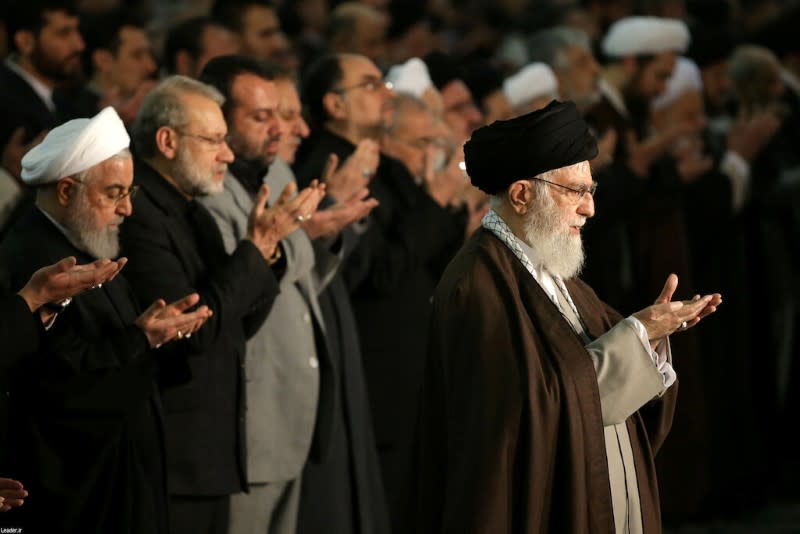 Iranian President Hassan Rouhani attends Friday prayers sermon led by the Iran's Supreme Leader Ayatollah Ali Khamenei, in Tehran
