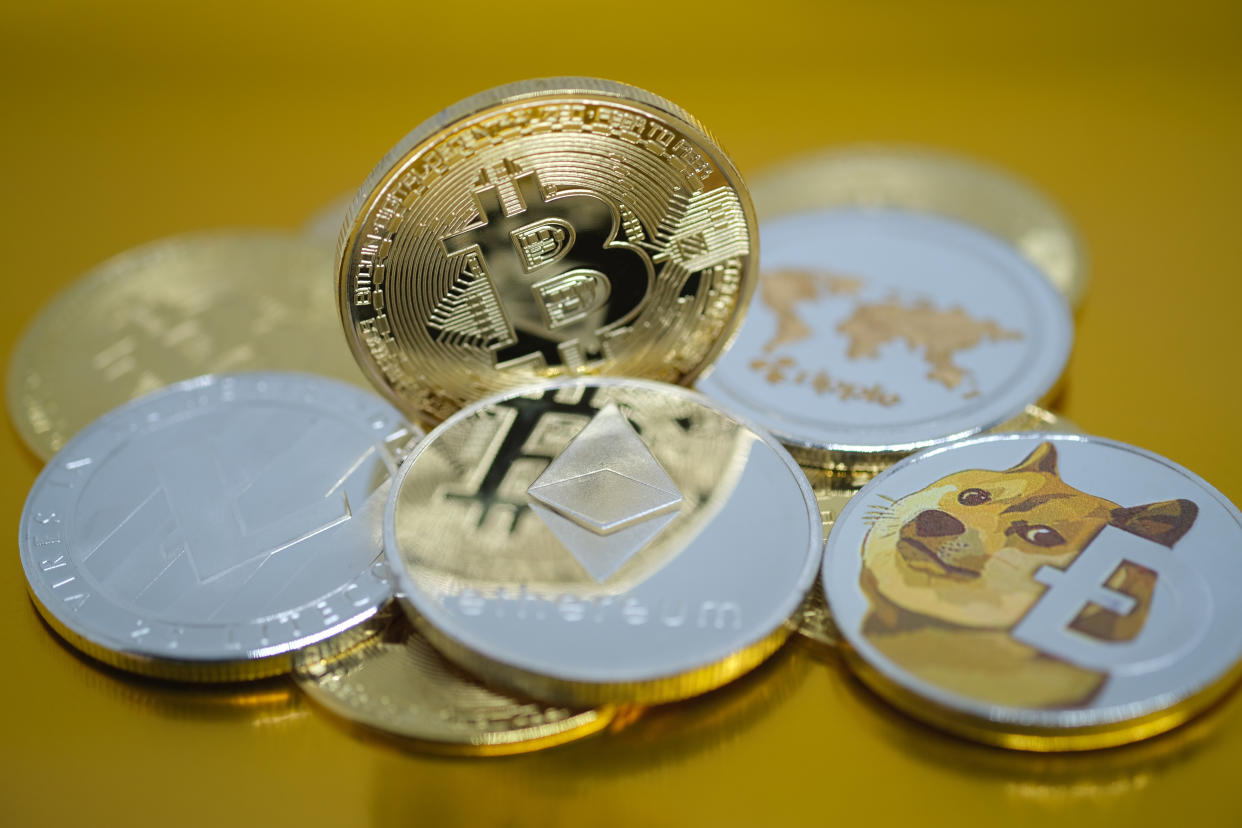 Visual representations of digital cryptocurrencies. Photo: Yuriko Nakao/Getty Images