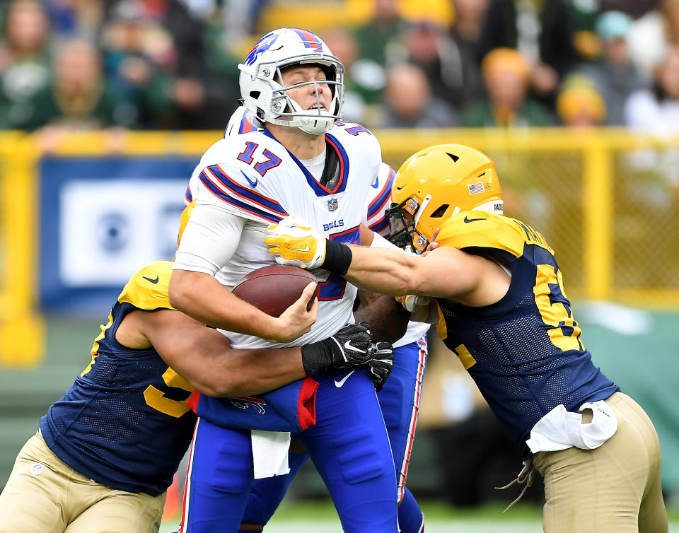 <p>Josh Allen #17 of the Buffalo Bills is sacked by Nick Perry #53 of the Green Bay Packers and Clay Matthews #52 during the second quarter of a game at Lambeau Field on September 30, 2018 in Green Bay, Wisconsin. (Photo by Stacy Revere/Getty Images) </p>