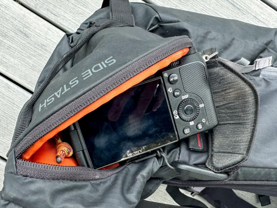 There's a stereotype of photographers taking poor quality photos of their used gear to sell it, and I'm following in that grand tradition with mediocre photos of my camera setup. But this pocket is great for camera gear.