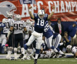 FILE - Indianapolis Colts quarterback Peyton Manning (18) celebrates running back Joseph Addai's three-yard touchdown run in the fourth quarter of the AFC Championship football game against the New England Patriots in Indianapolis, in this Sunday, Jan. 21, 2007, file photo. Peyton Manning never wanted to leave Indianapolis. But when a neck injury forced him to miss a season and the Colts moved on to Andrew Luck, he couldn’t have landed in a better place than Denver, where he produced a terrific second chapter to his Hall of Fame career. (AP Photo/Amy Sancetta, File)
