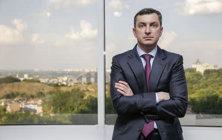 Ukraine's new tax agency chief Igor Bilous poses for a photograph at his office in Kiev August 6, 2014. Picture taken August 6, 2014. REUTERS/Konstantin Chernichkin