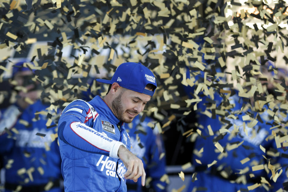 Kyle Larson reacts in Victory Lane after winning a NASCAR Cup Series auto race at Kansas Speedway in Kansas City, Kan., Sunday, Oct. 24, 2021. (AP Photo/Colin E. Braley)