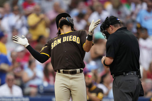 Manny Machado of the San Diego Padres celebrates after hitting an