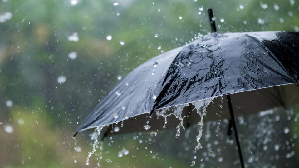 Heavy rain on an umbrella