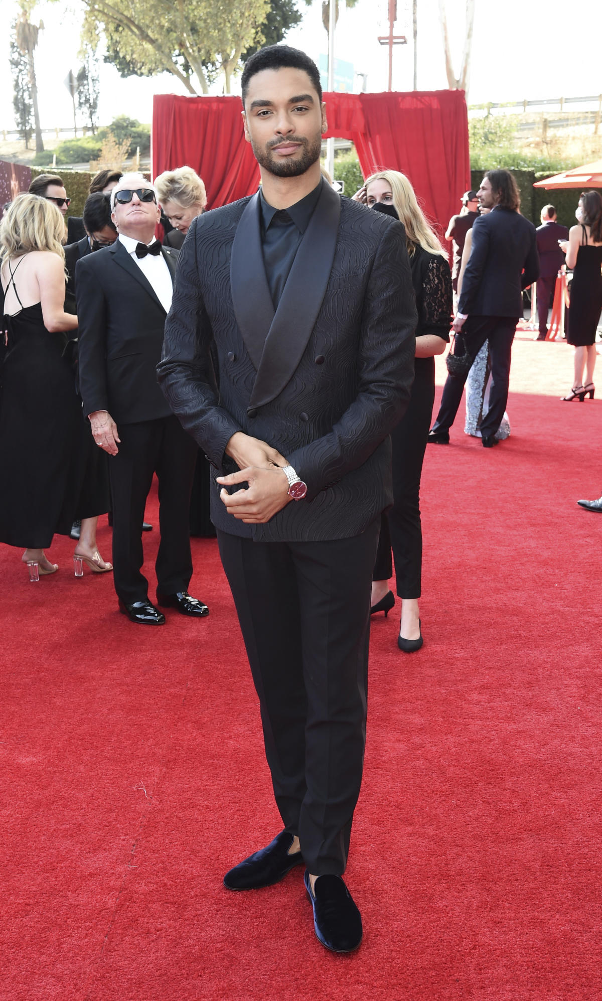 Reg Jean Page Attends First Emmys in Custom Giorgio Armani