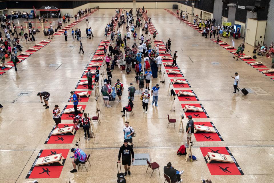 About 300 players compete in the American Cornhole League Kickoff Battle tournament at the American Bank Center on April 8, 2023, in Corpus Christi, Texas.  The tournament was the first in a four regular event season. The Championship tournament is held in August.