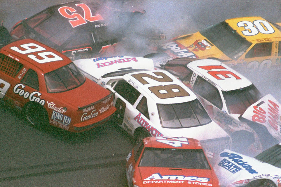 FILE - In this Feb. 17, 1990, file photo, race cars crash during the Goody's 300 auto race in Daytona Beach, Fla. (AP Photo/David Graham, File)