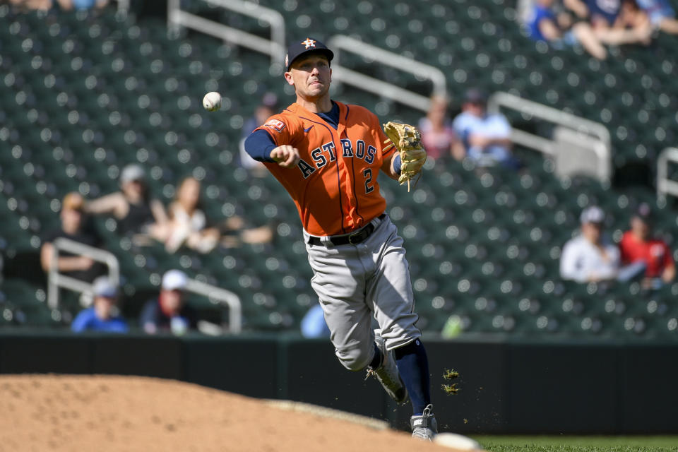 Houston Astros third baseman Alex Bregman throws to get Minnesota Twins Max Kepler out at first during the third inning of a baseball game, Thursday, May 12, 2022, in Minneapolis. (AP Photo/Craig Lassig)