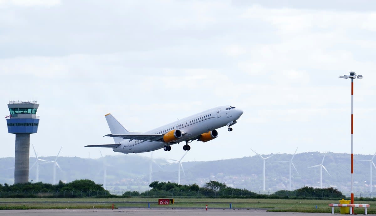 The Liverpool team plane flies out of John Lennon Airport on Friday (Martin Rickett/PA) (PA Wire)