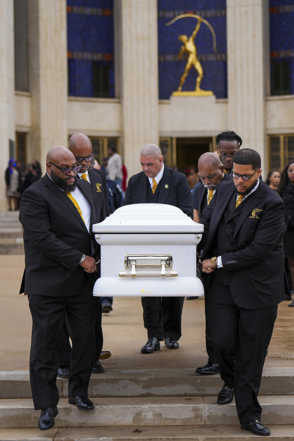 The casket of former U.S. Rep. Eddie Bernice Johnson departs the Hall of State in Fair Park after she lied in state on Monday, Jan. 8, 2024, in Dallas. Johnson, a trailblazing North Texas Democrat who served 15 terms in Congress, died at age 89 on Dec. 31. Her funeral will be held Tuesday at Concord Church in Dallas. (Smiley Pool/The Dallas Morning News via AP, Pool)