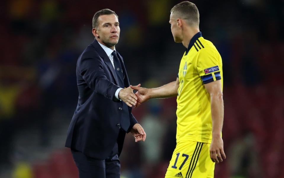 Andriy Shevchenko shakes hands with Sweden striker Viktor Claesson after Ukraine's 2-1 win in the round of 16 - GETTY IMAGES