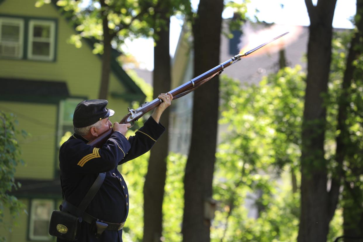 A Memorial Day service was held at Rapids Cemetery on Congress Avenue in Rochester,  May 31 2021 that included laying of wreaths for Pamela Harrison, an army nurse during the Civil War.  Alex Johnson of Fairport with the Sons of Union Veterans of the Civil War Abraham Lincoln Camp 6 fires off three shots after placing wreaths in front of Harrison’s grave.