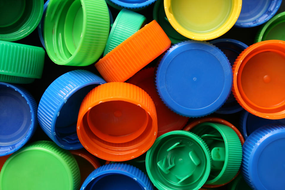 A pile of colourful bottle caps