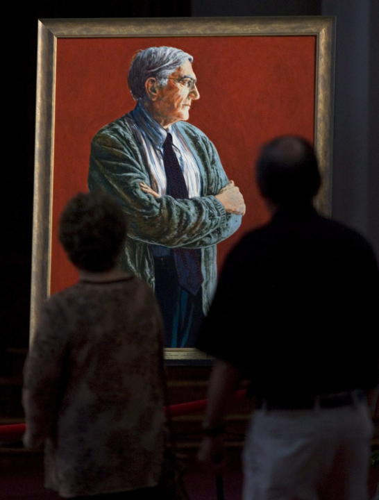 Mourners head past Romeo LeBlanc's official portrait by artist Christan Nicholson while paying their respects to the late governor general as he lay in state in the chapel at the Memramcook Institute in Memramcook, N.B. on July 2, 2009. LeBlanc died last week after a lengthy illness at age of 81.THE CANADIAN PRESS/Andrew Vaughan