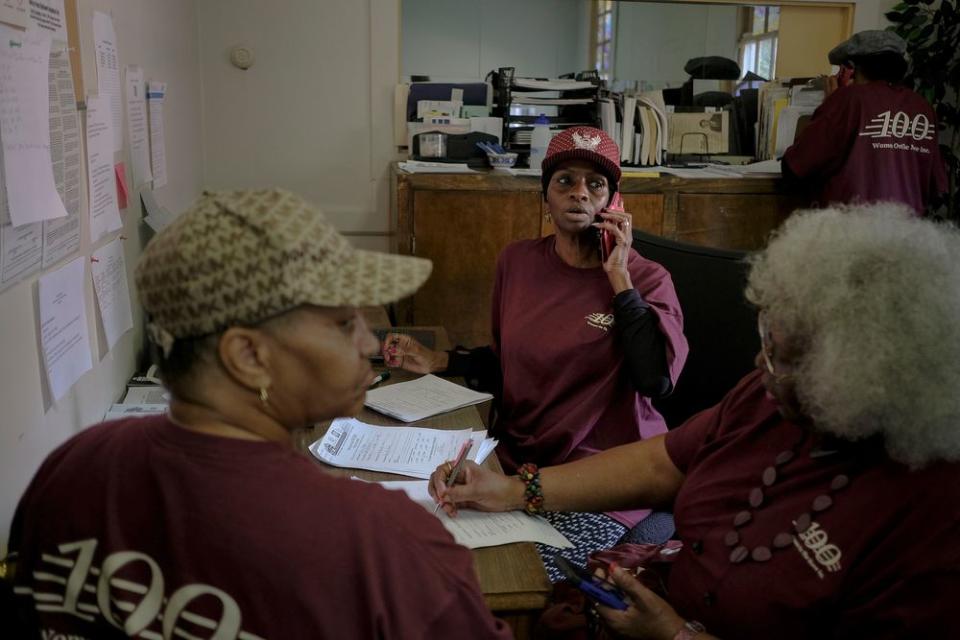 Members of Women on the Move confirm registration and polling precincts with callers at the Urban League of Greater Columbus in Columbus, Ga. on election day, Nov. 6, 2018.