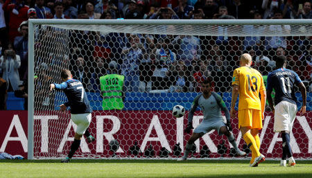 Soccer Football - World Cup - Group C - France vs Australia - Kazan Arena, Kazan, Russia - June 16, 2018 France's Antoine Griezmann scores their first goal from a penalty REUTERS/Toru Hanai