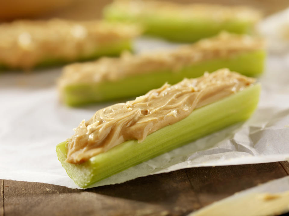 Peanut butter on sticks of celery