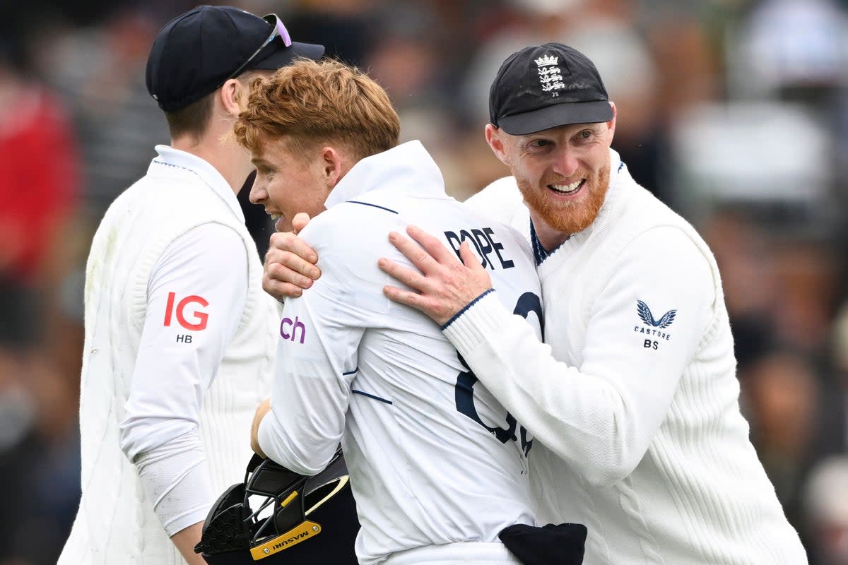 Captain Ben Stokes celebrates one of Ollie Pope’s brilliant catches (Andrew Cornaga/AP) (AP)