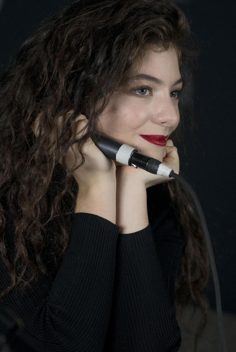 New Zealand's singer-songwriter Lorde answers questions from the press ahead of her performance in Mexico City, Mexico, Wednesday, April 9, 2014. The 17-year-old was named as a finalist in 12 categories for the Billboard Music Awards, announced on Wednesday, ahead of the May 18 awards ceremony. (AP Photo/Rebecca Blackwell)