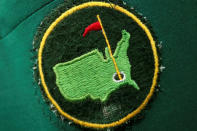 The green jacket of a member of the Augusta National Golf Club bearing a worn club patch embroidered onto the pocket is seen during the first day of practice rounds for the 2017 Masters in Augusta, Georgia, U.S. April 3, 2017. REUTERS/Jonathan Ernst