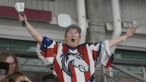 Chris Hicks supports her team, the Ogden Mustangs, as they play the Utah Outliers during the Mountain Division Championship game Wednesday, April 17, 2024, in West Valley City, Utah. It may look like an NHL team has just fallen into Salt Lake City's lap. But local organizers say the Arizona Coyotes' relocation to Utah is the product of a yearslong effort to beckon professional hockey and other elite sports to the capital city. (AP Photo/Rick Bowmer)