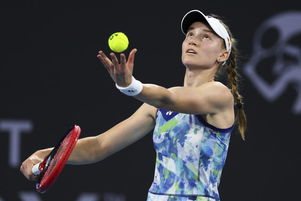 FILE - Elena Rybakina of Kazakhstan serves in her match against Olivia Gadecki of Australia during the Brisbane International tennis tournament in Brisbane, Australia, Wednesday, Jan. 3, 2024. Rybakina is one of the players to watch at the Australian Open. The year's first Grand Slam tennis tournament is scheduled to start at Melbourne Park on Sunday, Jan. 14. (AP Photo/Tertius Pickard, File)