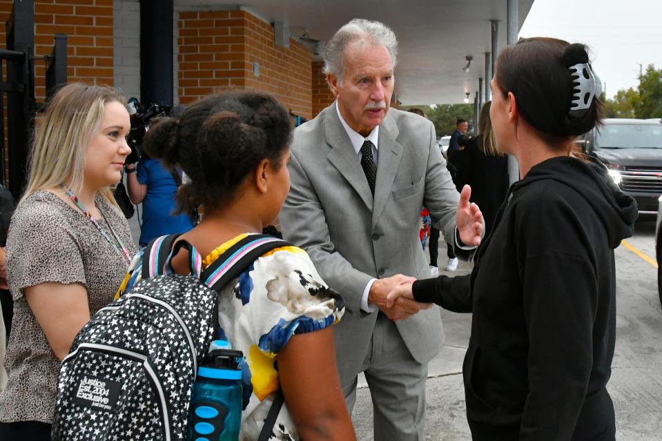 Robert Schiller, interim Brevard Public Schools superintendent, is pictured in January 2023 with students at Sabal Elementary in Melbourne. At a school board work session, he suggested it might be in their best interest to establish the “Brevard Public Schools Charter School District,” allowing the board or the to-be-hired superintendent to be the chartering official.