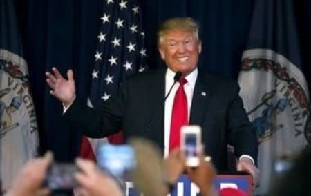 Republican presidential candidate Donald Trump speaks at his campaign rally in Manassas, Virginia, December 2, 2015. REUTERS/Gary Cameron