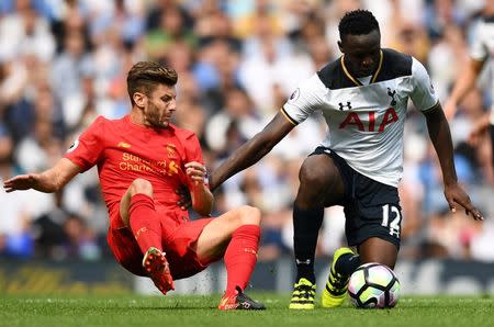 Football Soccer Britain - Tottenham Hotspur v Liverpool - Premier League - White Hart Lane - 27/8/16 Tottenham's Victor Wanyama in action with Liverpool's Adam Lallana Reuters / Dylan Martinez Livepic