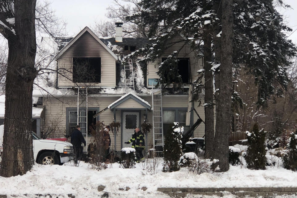 Des Plaines firefighters work at the scene of a house fire on the 700 block of W. Oakton that claimed the lives of 5 people on Wednesday morning Jan. 27, 2021 in Des Plaines, Ill. (Mark Welsh/Daily Herald via AP)