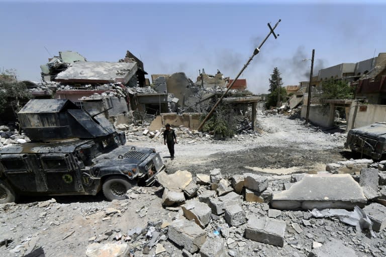 An Iraqi Counter-Terrorism Service member patrols as the elite force advances into west Mosul's al-Saha neighbourhood on May 29, 2017