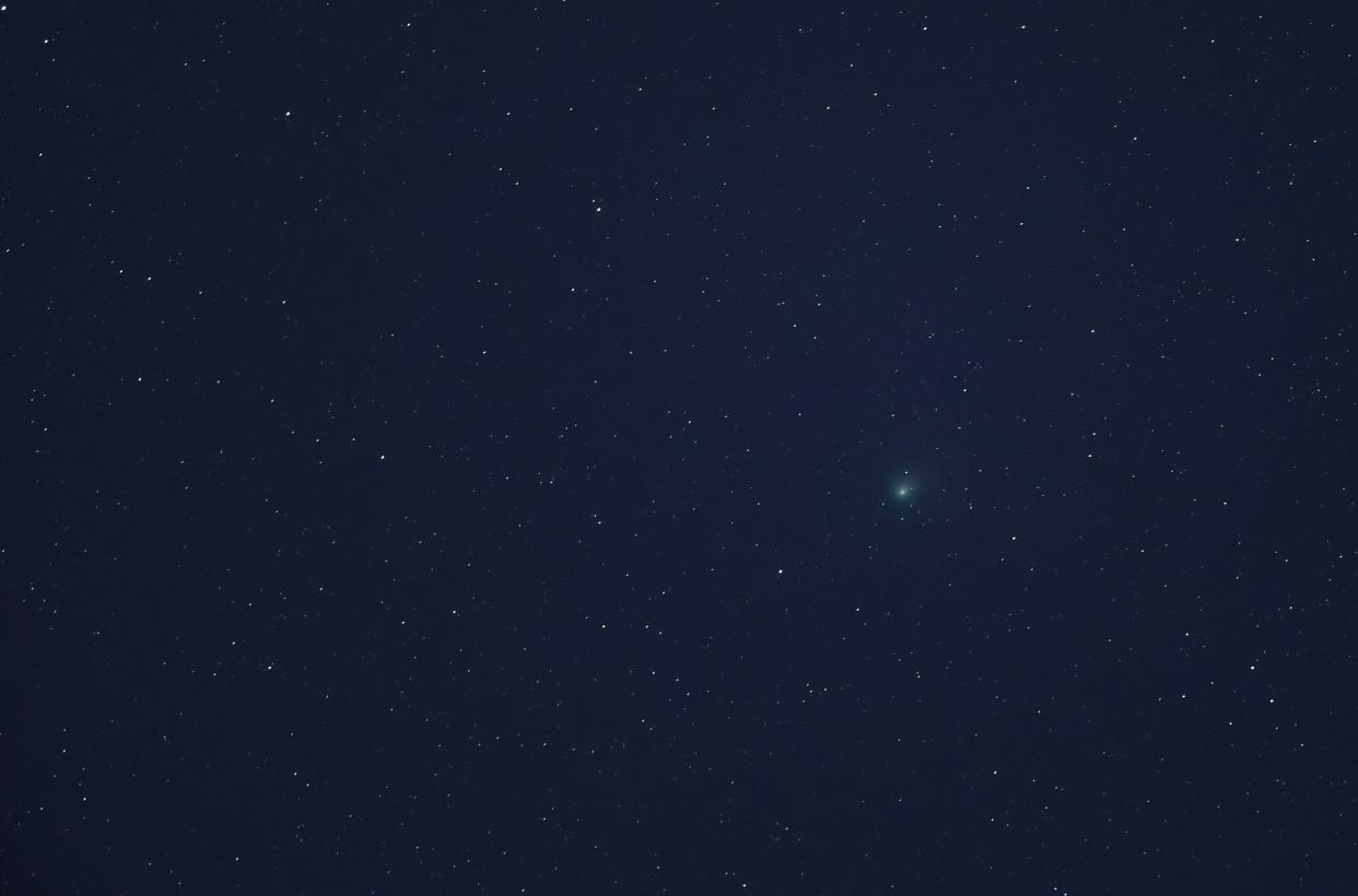 Comet C/2022 E3 (ZTF) is visible in the sky above the Mojave National Preserve in San Bernadino County as it approaches Earth for the first time in about 50,000 years on January 31, 2023 near Baker, California. The comet was discovered on March 2, 2022, and will be at its closest point to Earth on February 1, 2023. Its orbit extends far out into our solar system and has a green aura because it is passing close enough to the sun for the outgassing of its diatomic carbon molecules to react with the solar wind. (Getty Images)