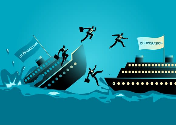 A cartoon of four businessmen holding on to their briefcases while abandoning ship