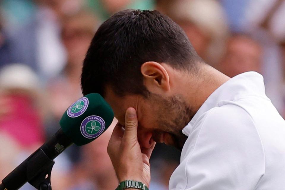 Reign over: Novak Djokovic could not hold back the tears after his record bid fell just short (REUTERS)