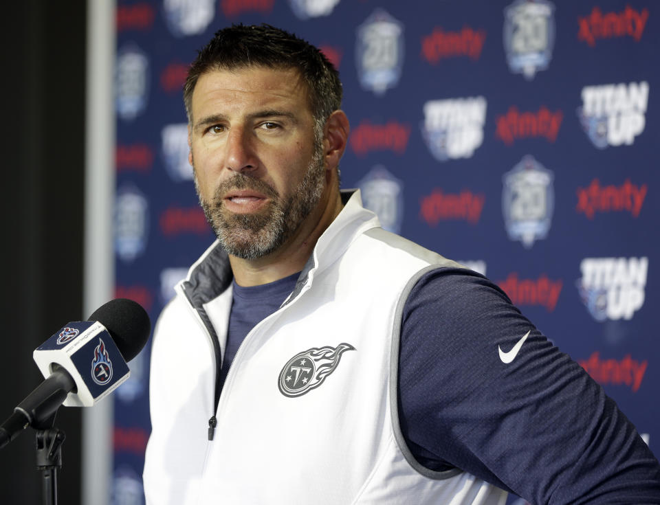 FILE - In this July 27, 2018, file photo, Tennessee Titans head coach Mike Vrabel answers questions during a news conference after a practice at NFL football training camp in Nashville, Tenn. The NFL tapped Vrabel to narrate a video detailing the new lowering the head to initiate contact rule, hoping the man who played 14 years as a linebacker in the league could more easily explain how players should adapt. (AP Photo/Mark Humphrey, File)