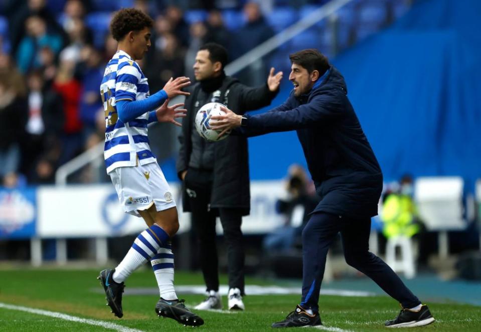 Veljko Paunovic, Reading’s fifth manager in less than four years, hands the ball to Tyrell Ashcroft.