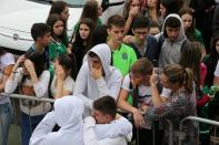 <p>Fans of Chapecoense soccer team are pictured in front of the Arena Conda stadium in Chapeco, Brazil, November 29, 2016. REUTERS/Paulo Whitaker </p>